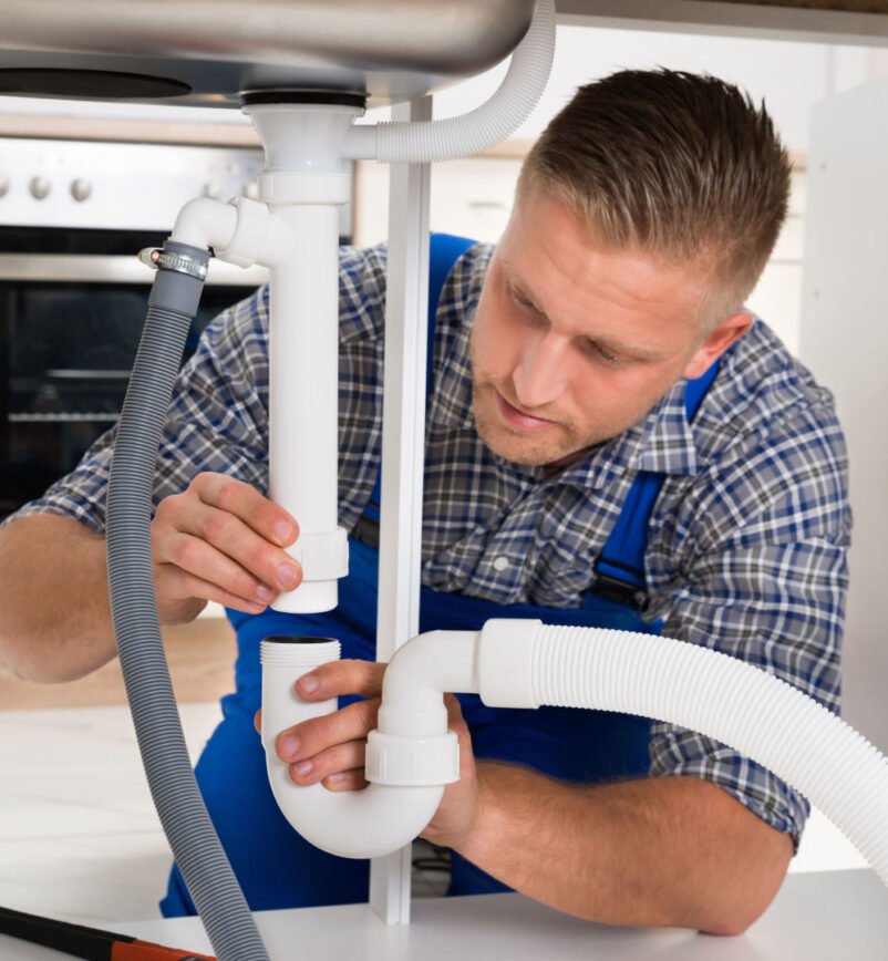 plumber-repairing-pipe-of-sink-5cb9aa44833e8